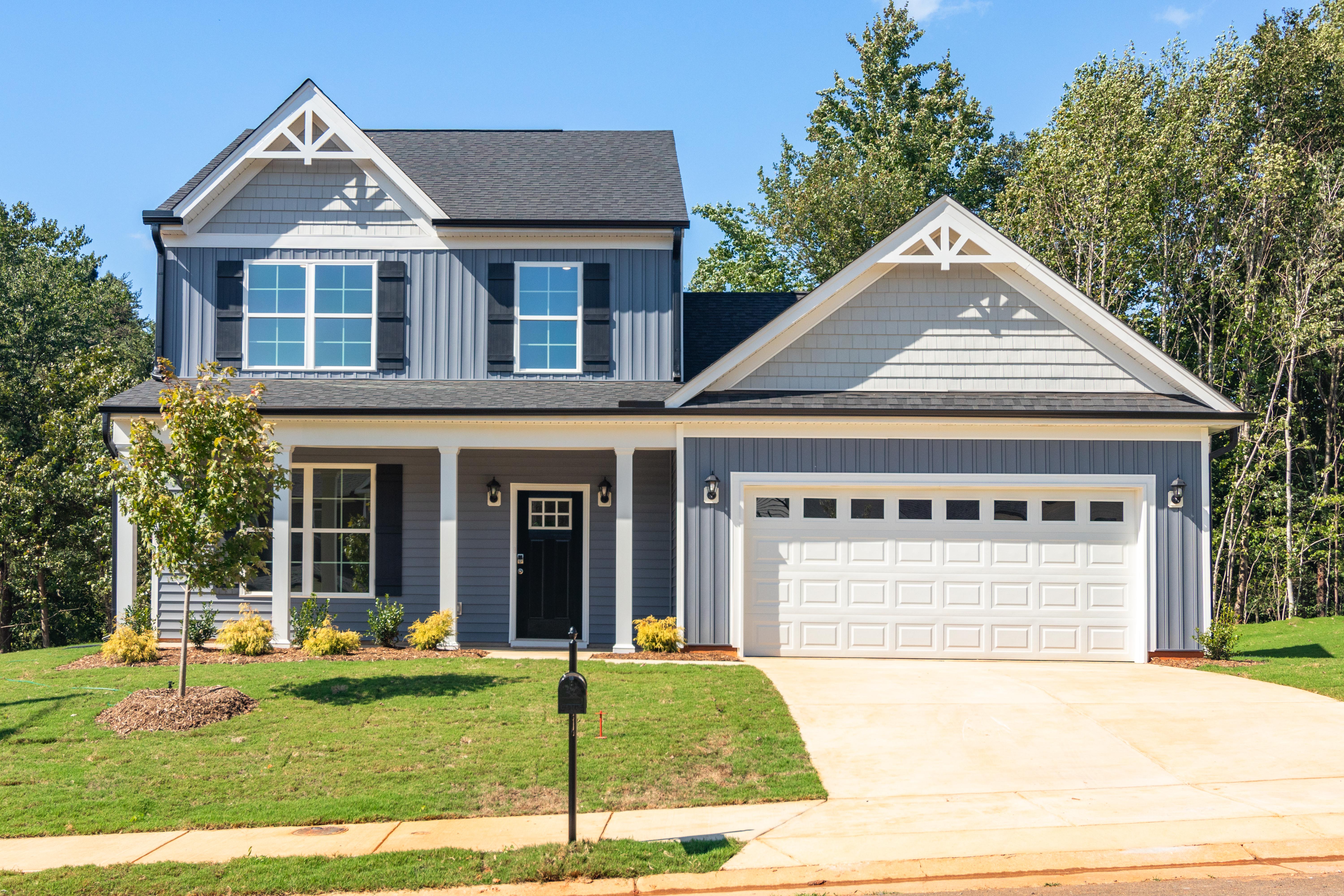 New spec home built for an investor, with covered front porch and two car garage